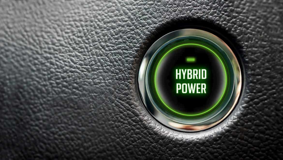 hybrid power message on automobile ignition button with large copy space