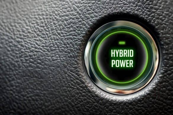 hybrid power message on automobile ignition button with large copy space