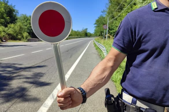 Policeman with a paddle close-up