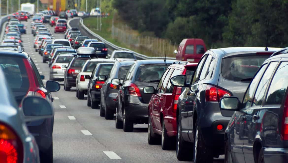 Typical scene during rush hour. A traffic jam with rows of cars.  Shallow depth of field.